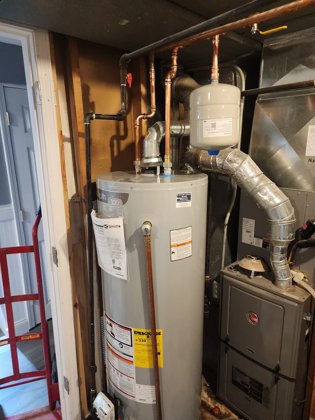 AO Smith gas water heater installed with new copper piping and thermal expansion tank